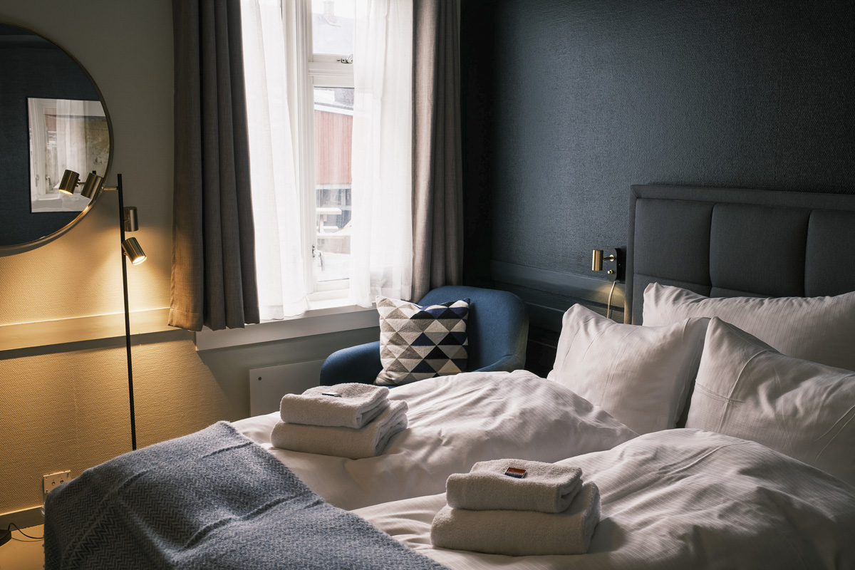 Cozy little hotel rooms with delicious bed linens